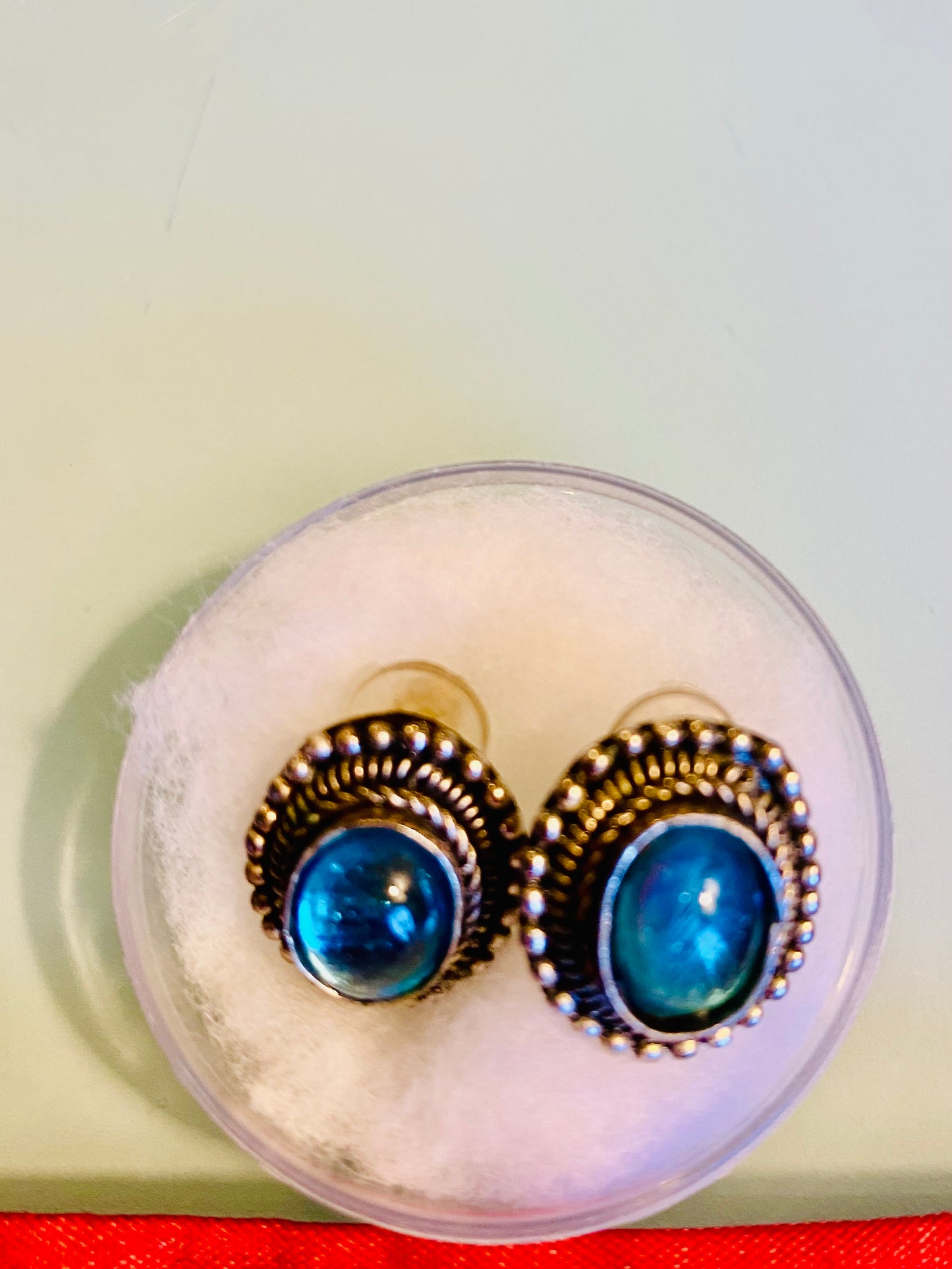 SILVER WITH AQUAMARINE STONE STUDS APPROX. .5" DIAMETER/ SB062