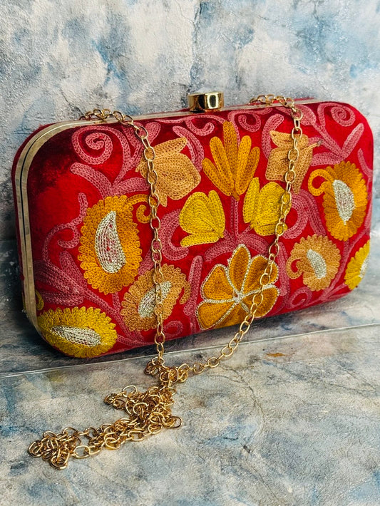 EMBROIDERED VELVET PURSE ON A ROYAL RED BACKGROUND WITH GOLD AND PINK FLORALS