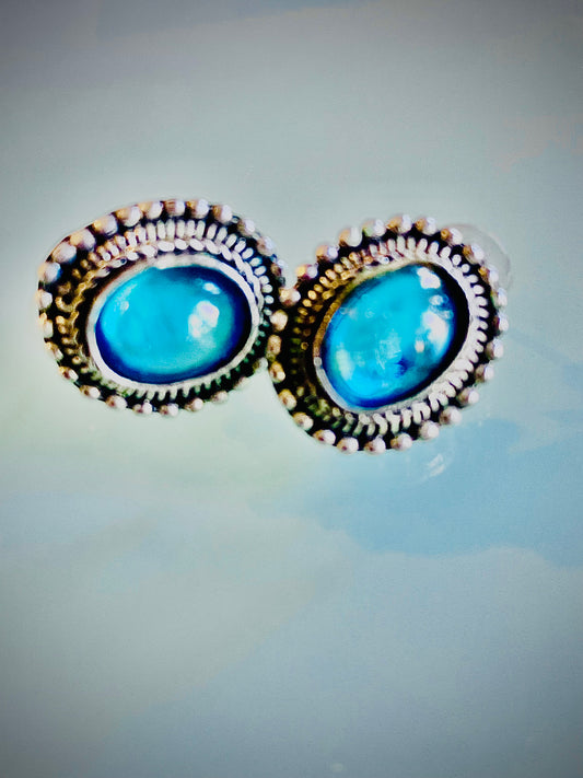 SILVER WITH AQUAMARINE STONE STUDS APPROX. .5" DIAMETER/ SB062